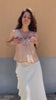 Flavia Amato indossa Canottiera Giulia Micromodal cupro comoda scollo a v moda etica artigianale brand malia lab abbigliamento biologico sostenibile inserto decorativo abbigliamento artigianale donna