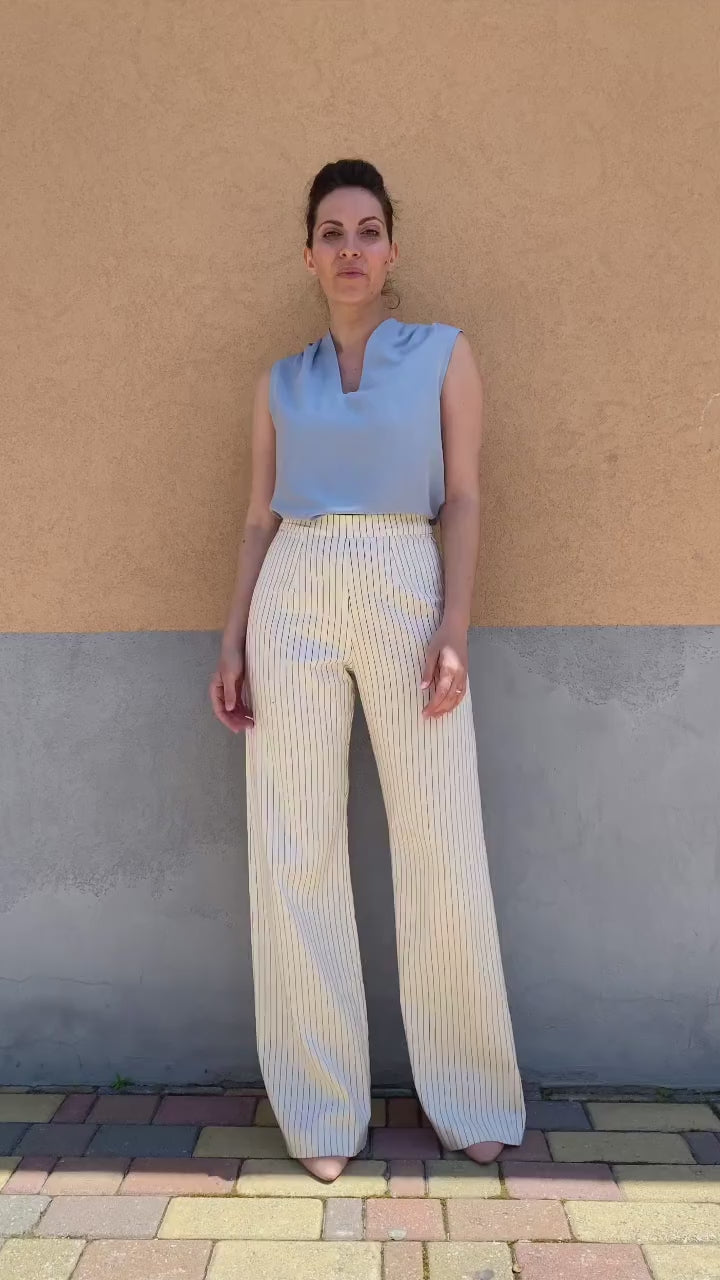 Flavia Amato indossa Pantalone palazzo gessato lyocell seacell abbigliamento sartoriale brand malia lab tessuti naturali pantalone sartoriale su misura