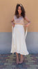 Flavia Amato indossa gonna Anna in bamboo modello a portafoglio incrociato malia lab moda etica abbigliamento sostenibile gonna sartoriale fibre naturali